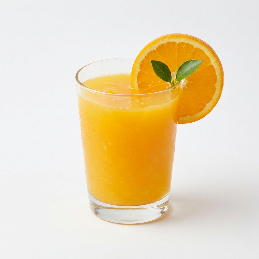 Fresh orange juice in clear glass
